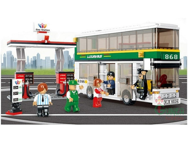Double Decker Bus and Gas Station